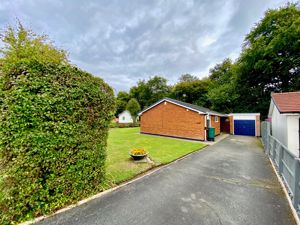 Front Elevation/Driveway- click for photo gallery